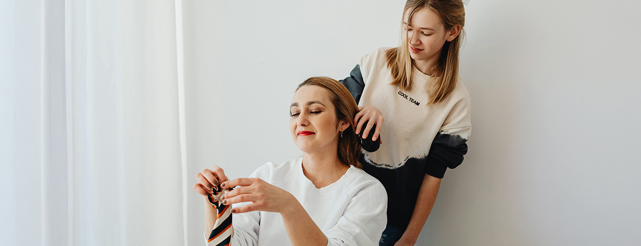 daughter giving her mother a makeover