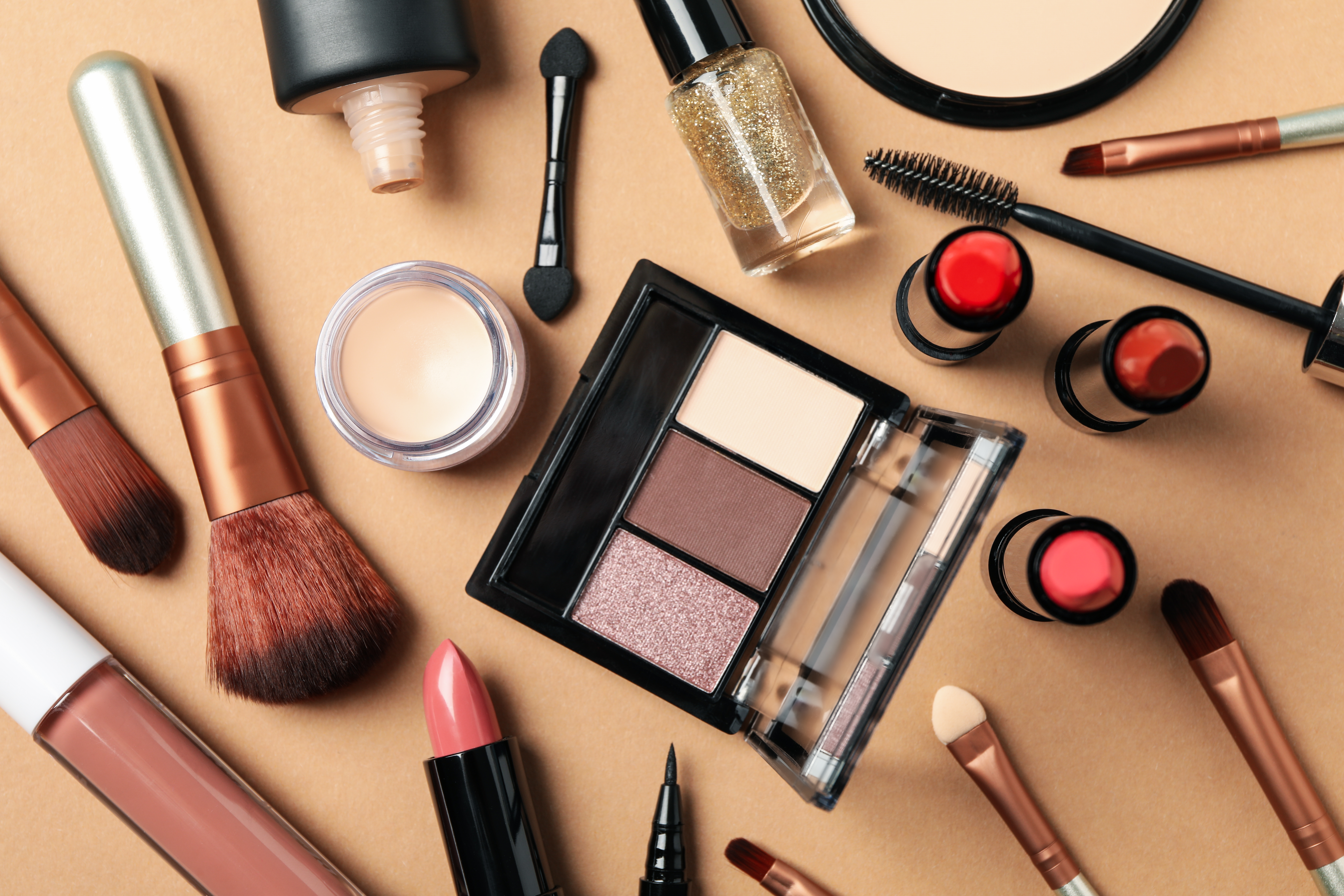 best makeup brands displayed in flat lay