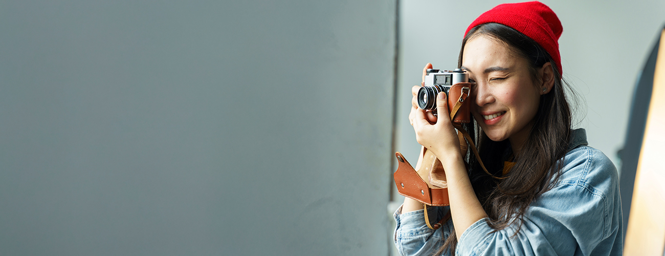 Female photographer taking a picture