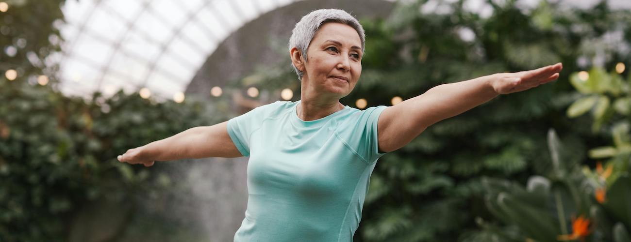woman in workout gear practising yoga